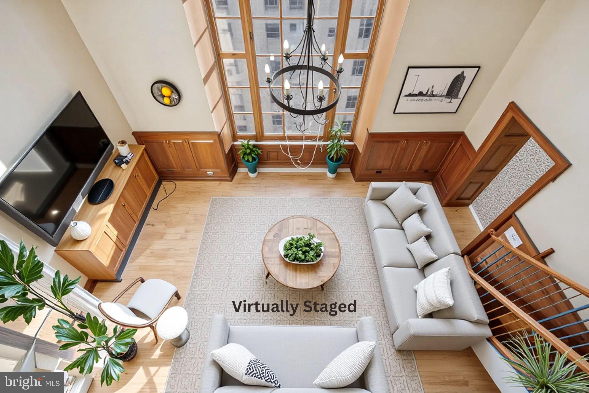 1600 Arch Street, Unit 2008 Philadelphia, PA 19103 - Photo 24 of 25 a living room with furniture and a flat screen tv