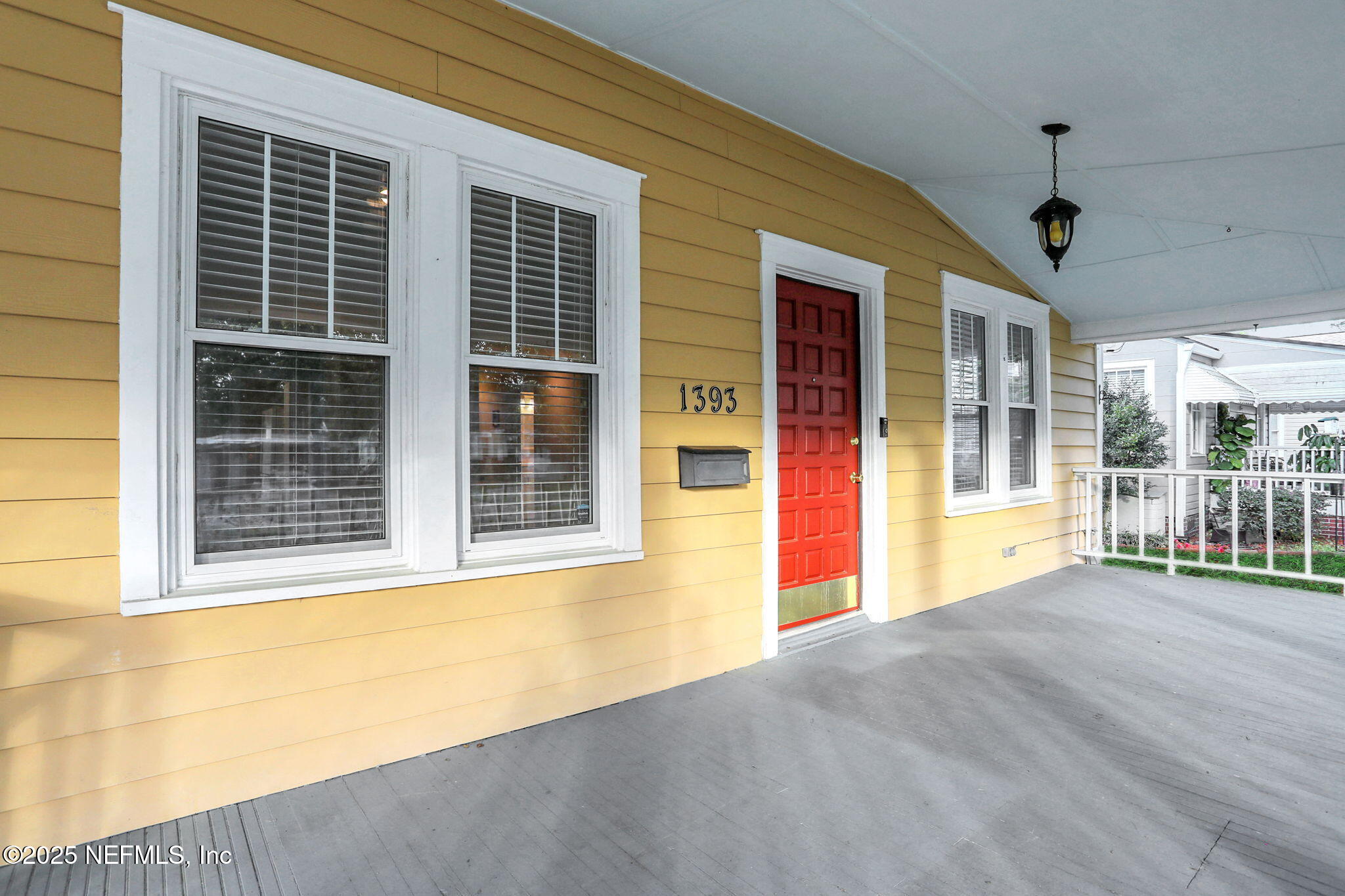 1393 Wolfe Street Jacksonville, FL 32205 - Photo 2 of 36 a view of an empty room with a window and balcony