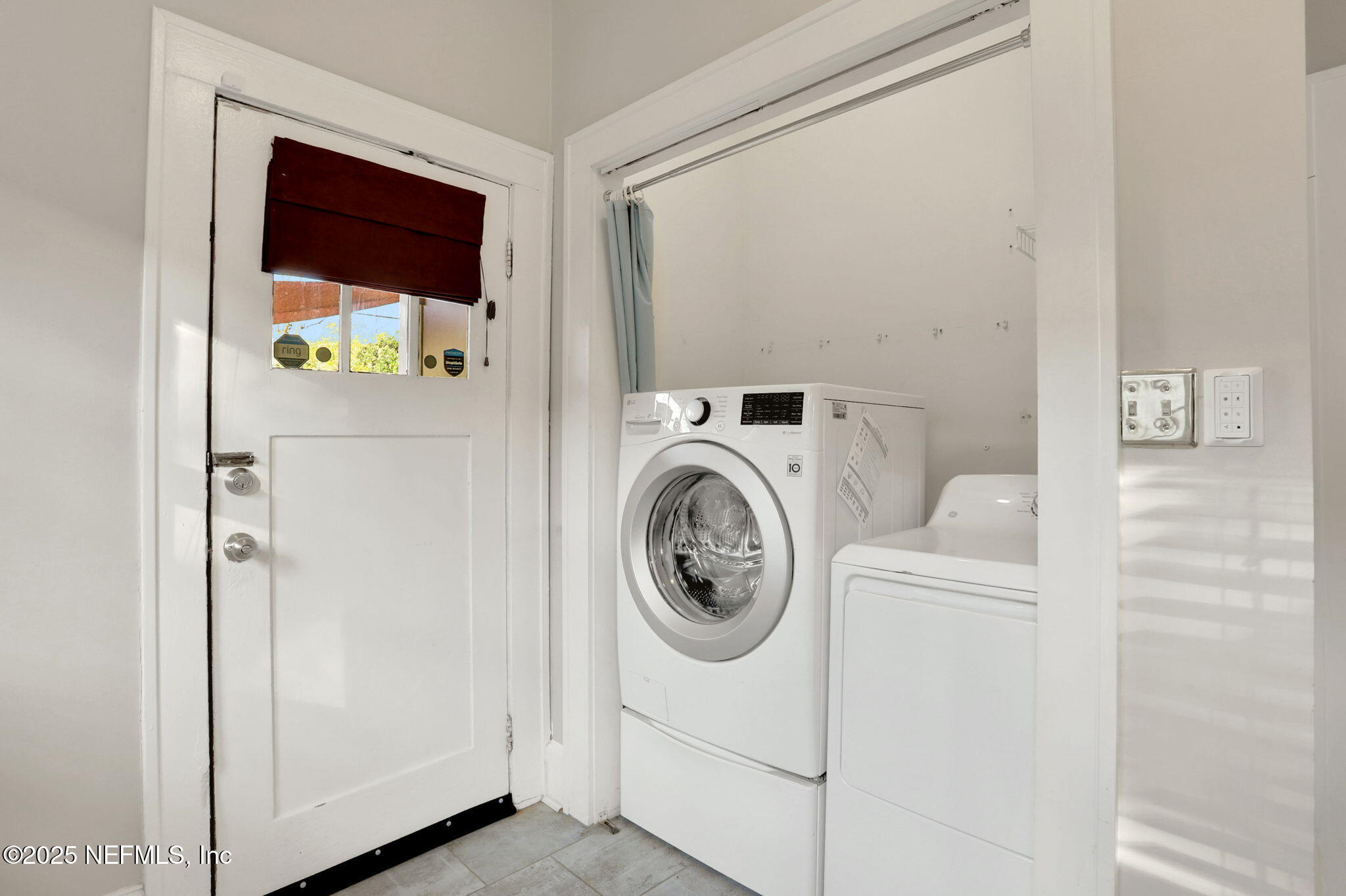 1393 Wolfe Street Jacksonville, FL 32205 - Photo 25 of 36 a utility room with dryer and washer