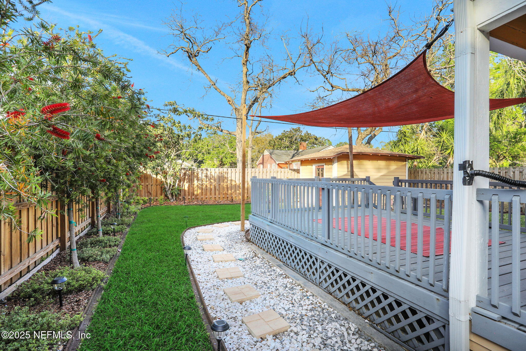 1393 Wolfe Street Jacksonville, FL 32205 - Photo 26 of 36 a view of a porch with a yard