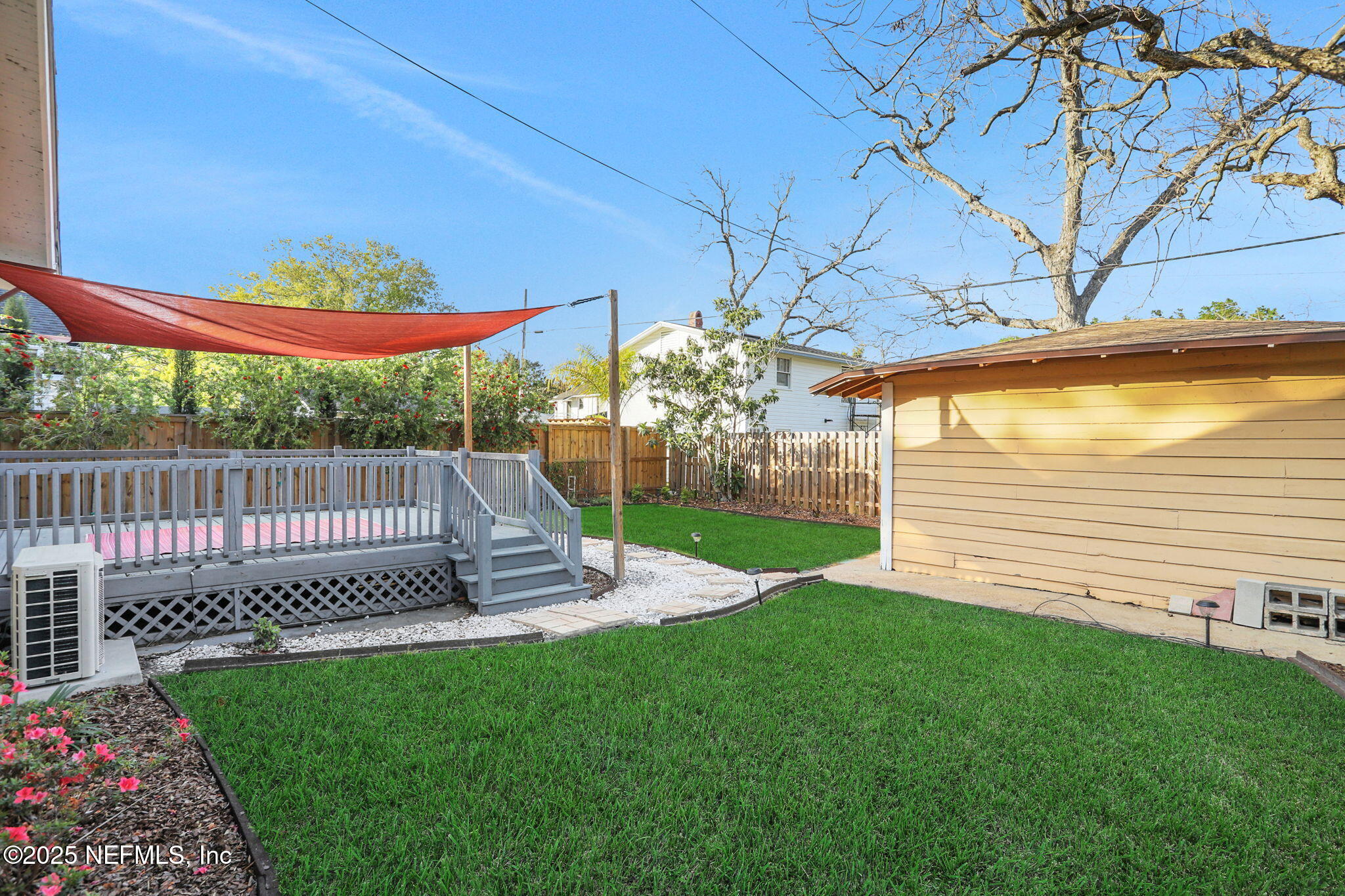 1393 Wolfe Street Jacksonville, FL 32205 - Photo 30 of 36 a view of a chair and table in the garden