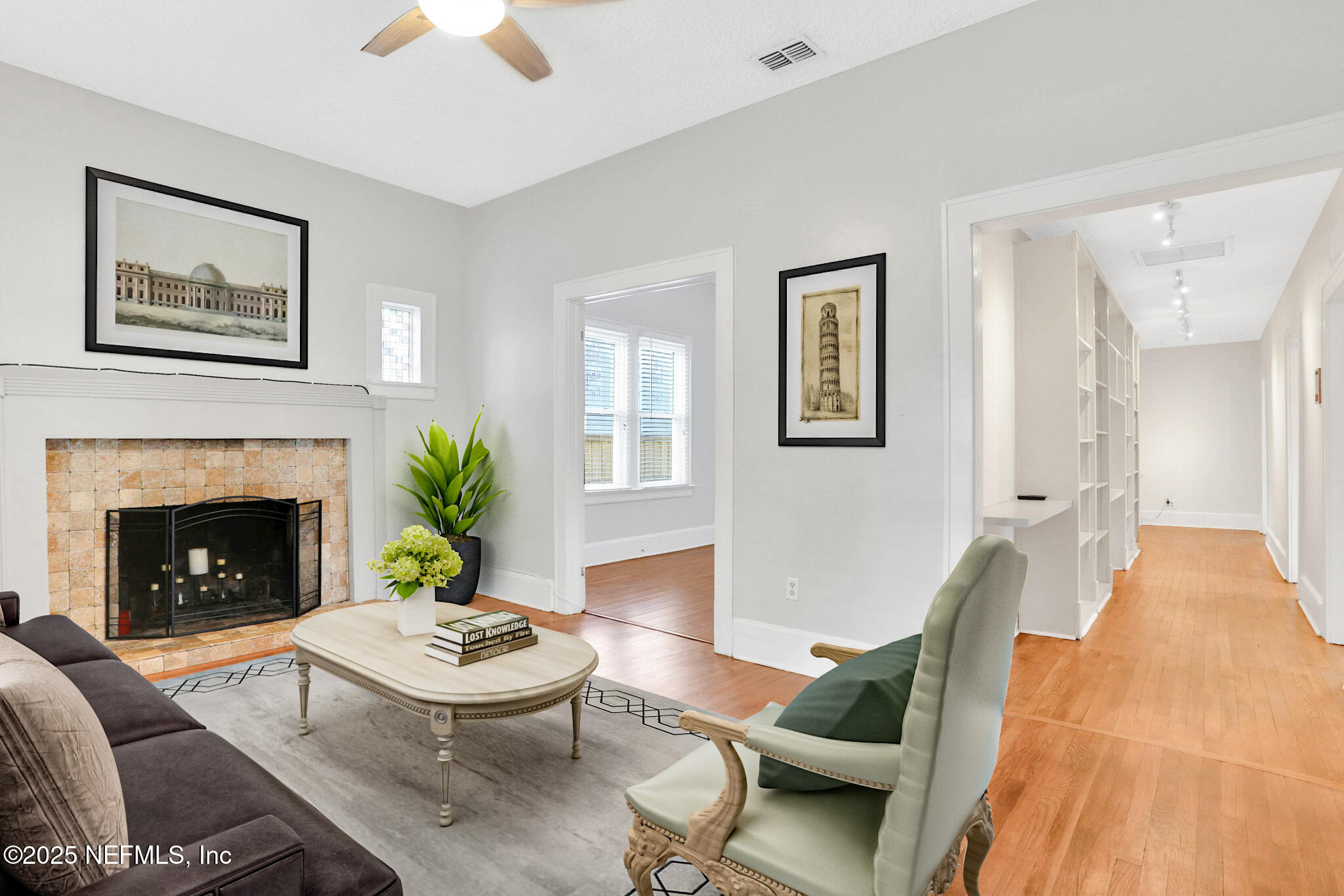 1393 Wolfe Street Jacksonville, FL 32205 - Photo 4 of 36 a living room with furniture and a fireplace