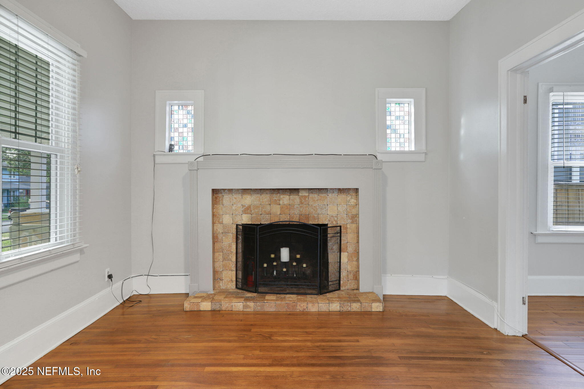 1393 Wolfe Street Jacksonville, FL 32205 - Photo 6 of 36 a living room with a fireplace and a fireplace