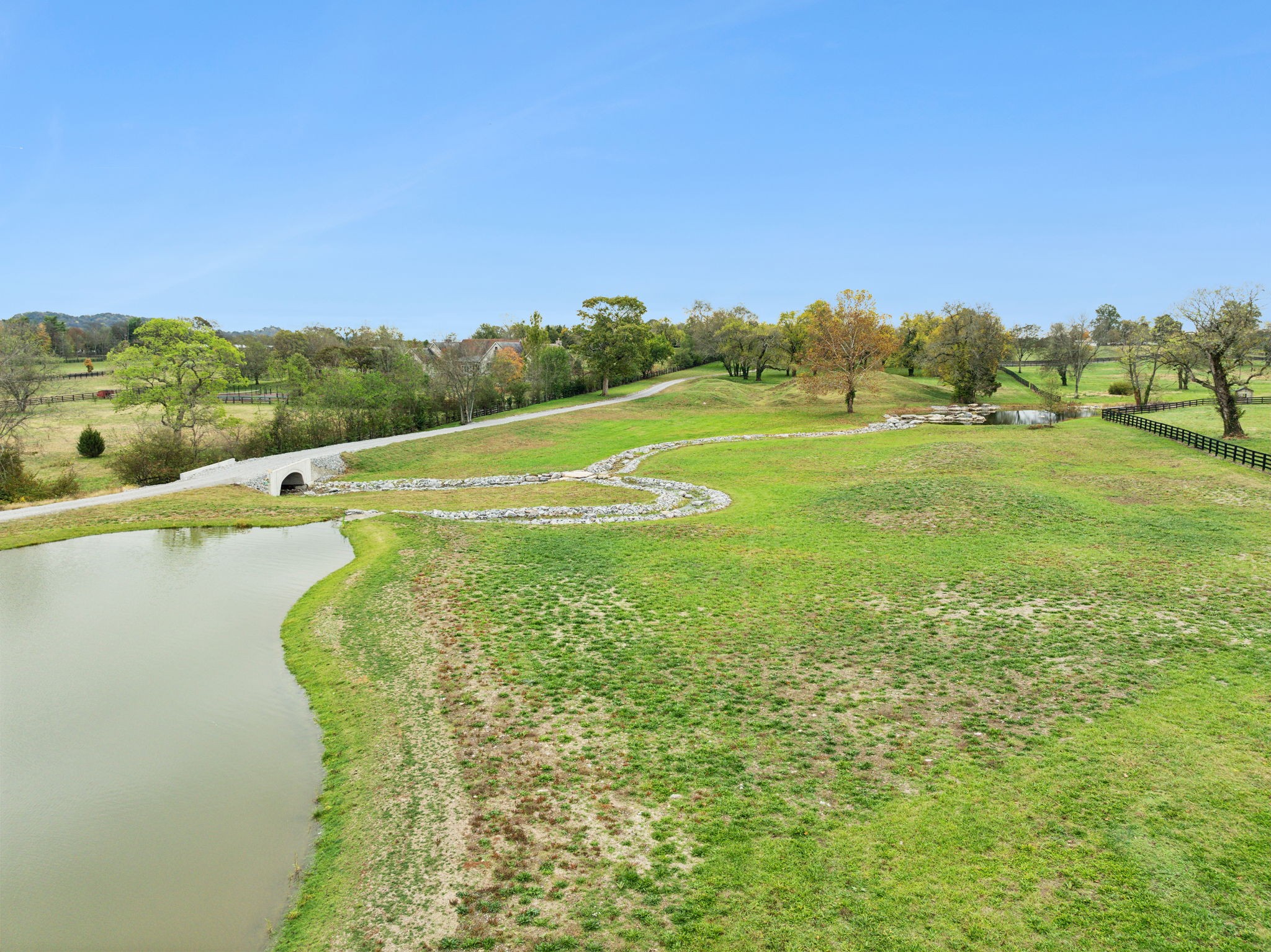 1418 Moran Road Franklin, TN 37069 - Photo 11 of 19 a view of a lake with a big yard