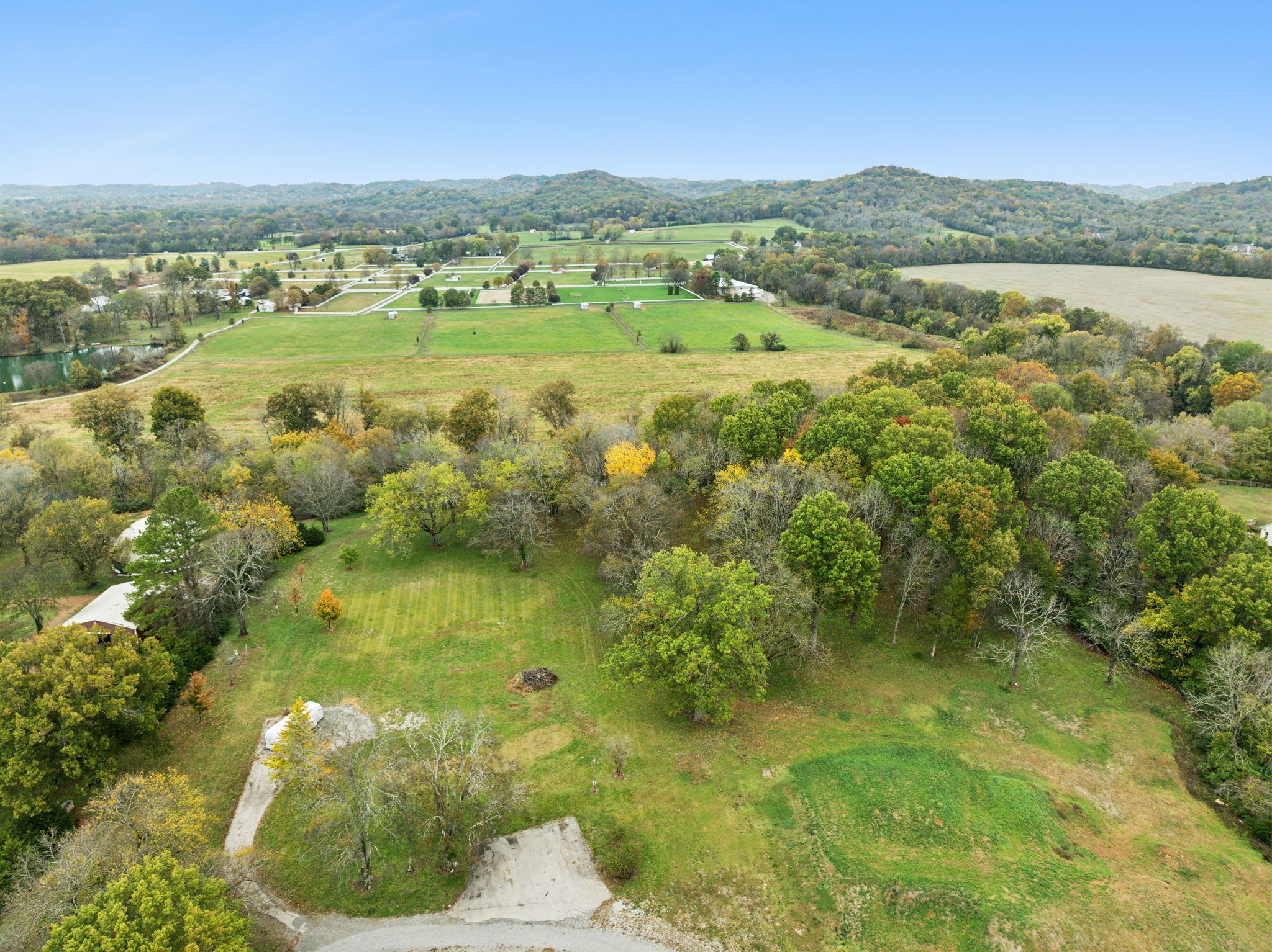 1418 Moran Road Franklin, TN 37069 - Photo 13 of 19 a view of a lake with a mountain in the background