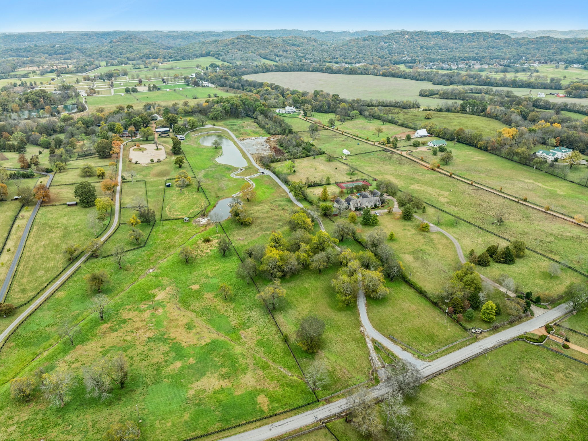 1418 Moran Road Franklin, TN 37069 - Photo 4 of 19 an aerial view of residential houses with outdoor space and river