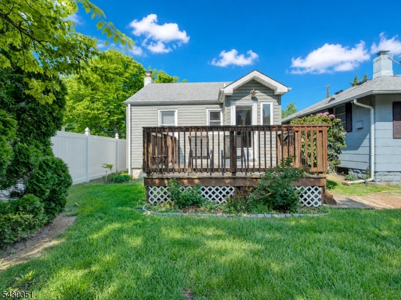 105 Lower Road Linden, NJ 07036 - Photo 13 of 16 a view of a house with a yard and garden