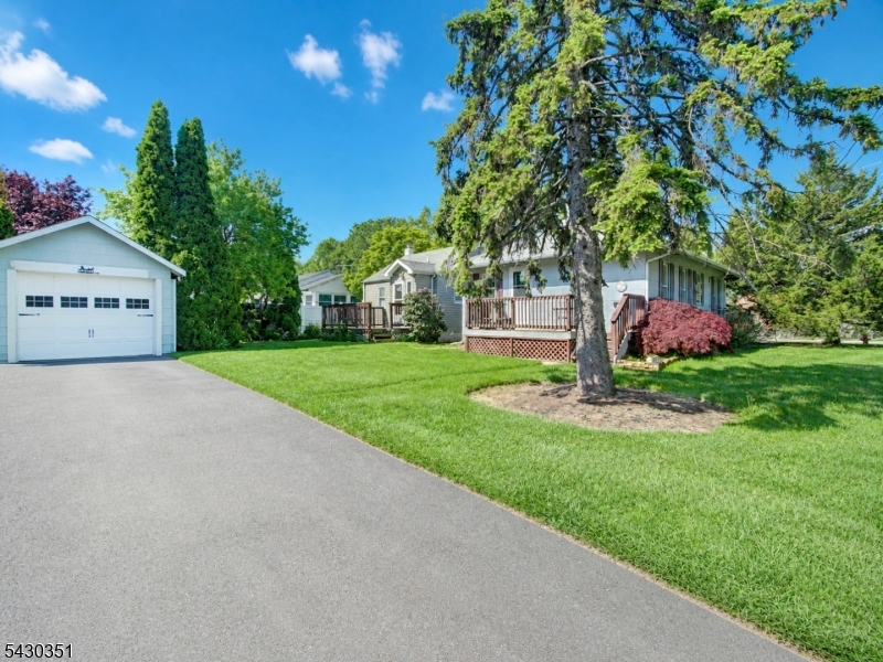 105 Lower Road Linden, NJ 07036 - Photo 15 of 16 a front view of a house with garden