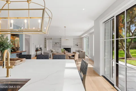 a view of a living room and entry way