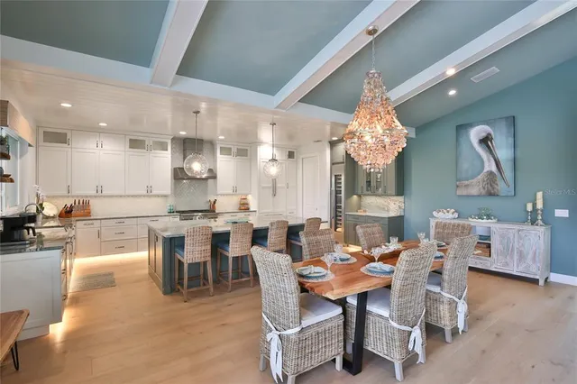 a view of an entryway with wooden floor and a livingroom