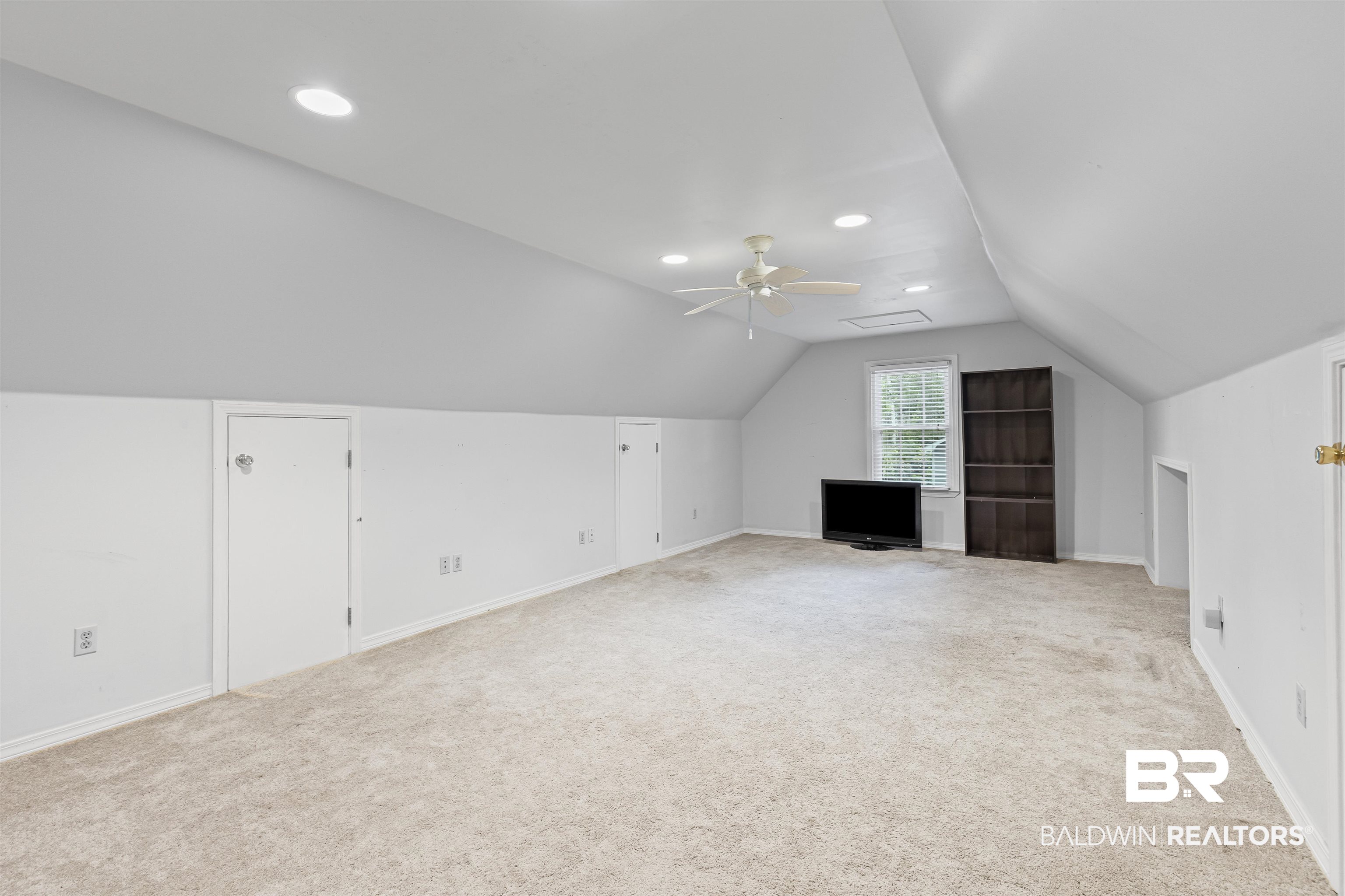 5324 Oak Bend Court Mobile, AL 36609 - Photo 35 of 49 Additional living space with lofted ceiling, light carpet, ceiling fan, and recessed lighting