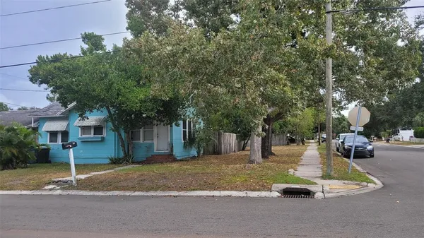 a view of a house with a park