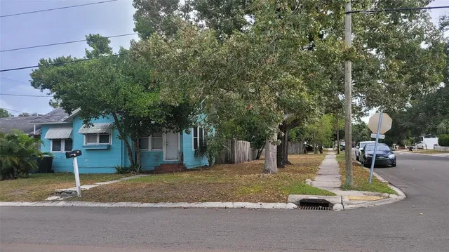 a view of a house with a park