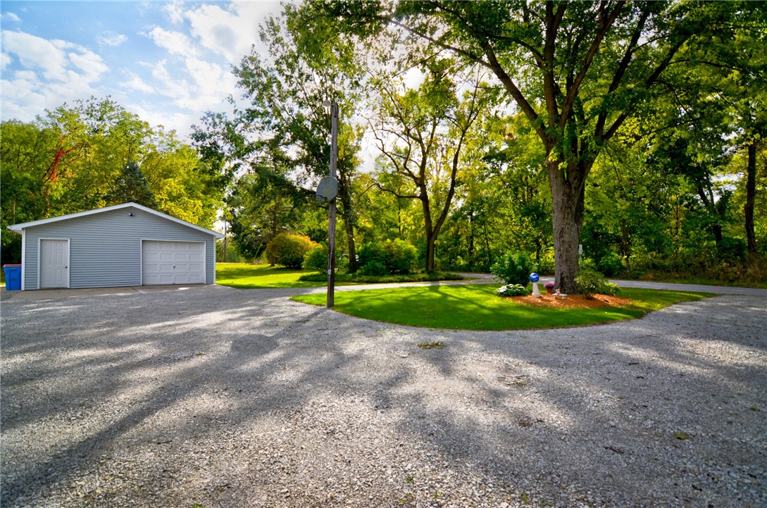 9234 Cabin Road Argenta, IL 62501 - Photo 13 of 47 a view of a house with a yard and basketball court
