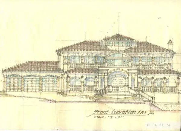 a view of a large building with a lake