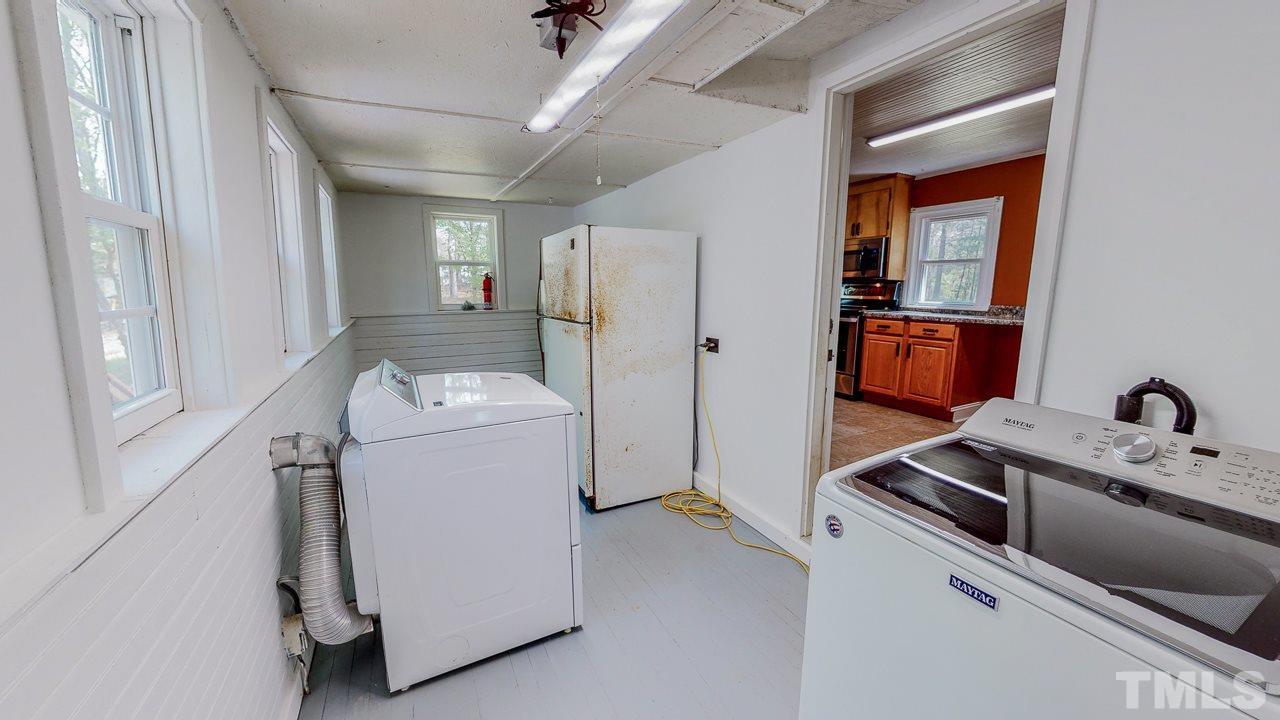 7089 Virgilina Road Roxboro, NC 27574 - Photo 22 of 28 a utility room with dryer and washer