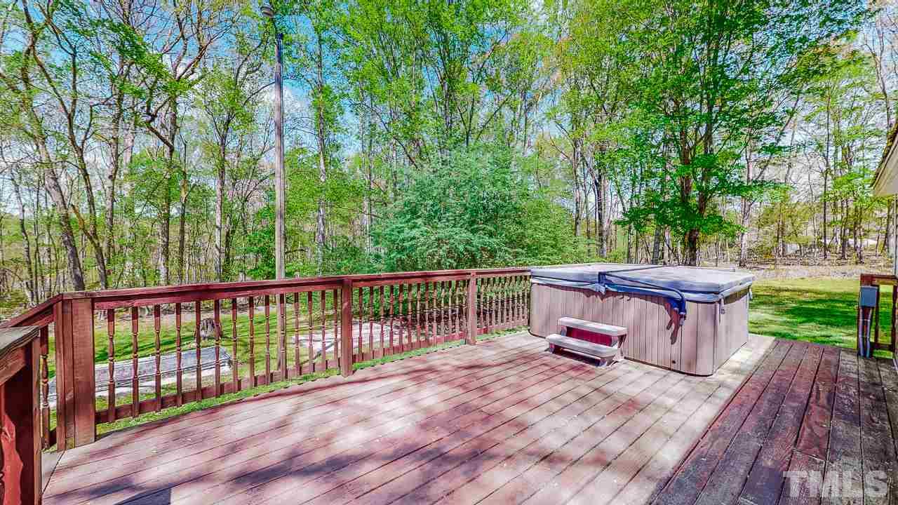 7089 Virgilina Road Roxboro, NC 27574 - Photo 24 of 28 a view of a two chairs on the deck