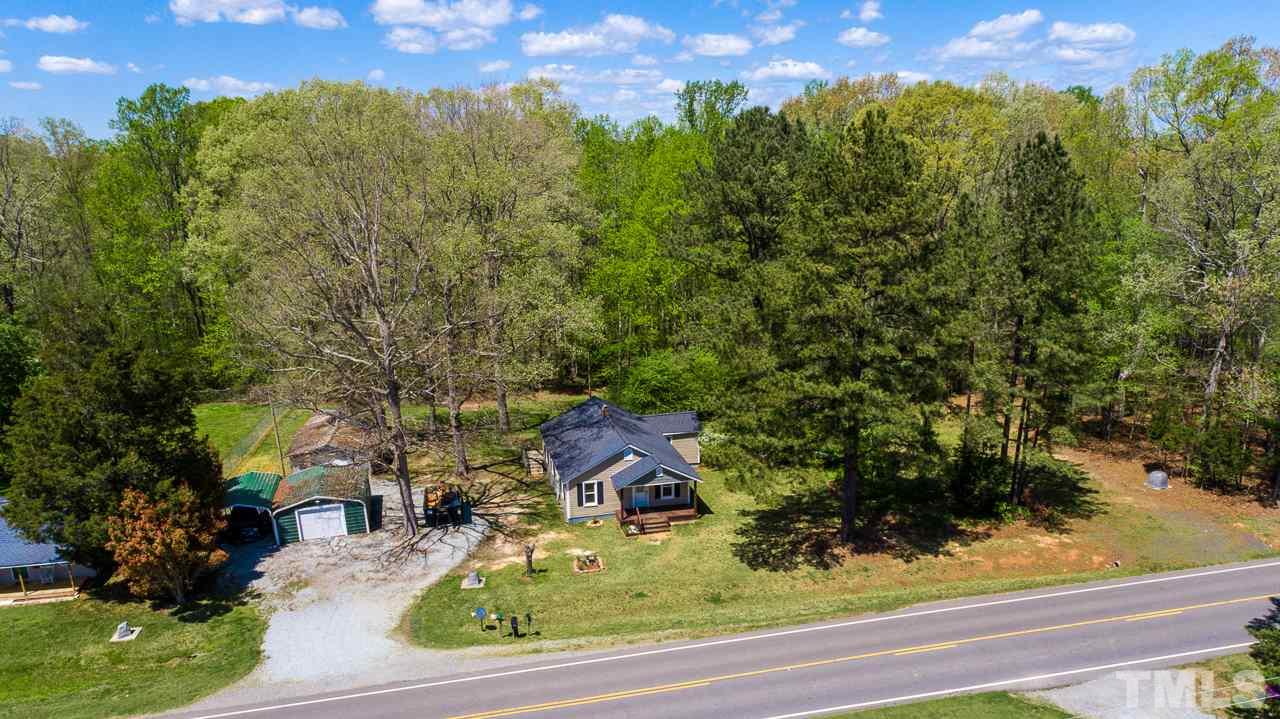 7089 Virgilina Road Roxboro, NC 27574 - Photo 8 of 28 view of a yard