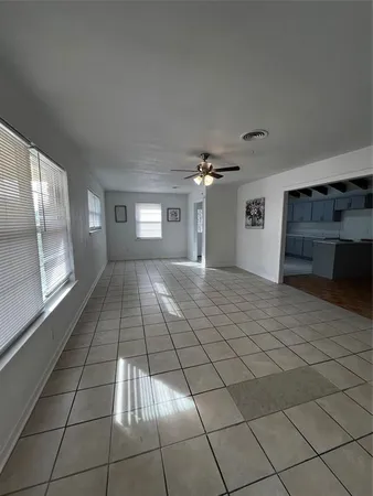 a view of an empty room and window