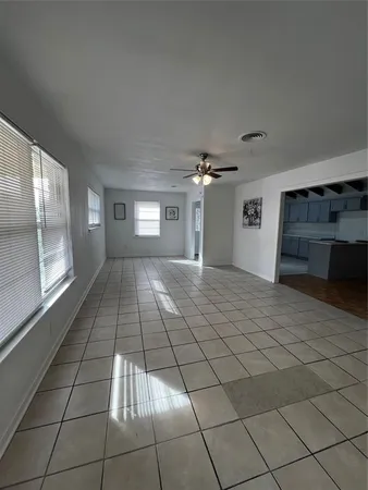 a view of an empty room and window