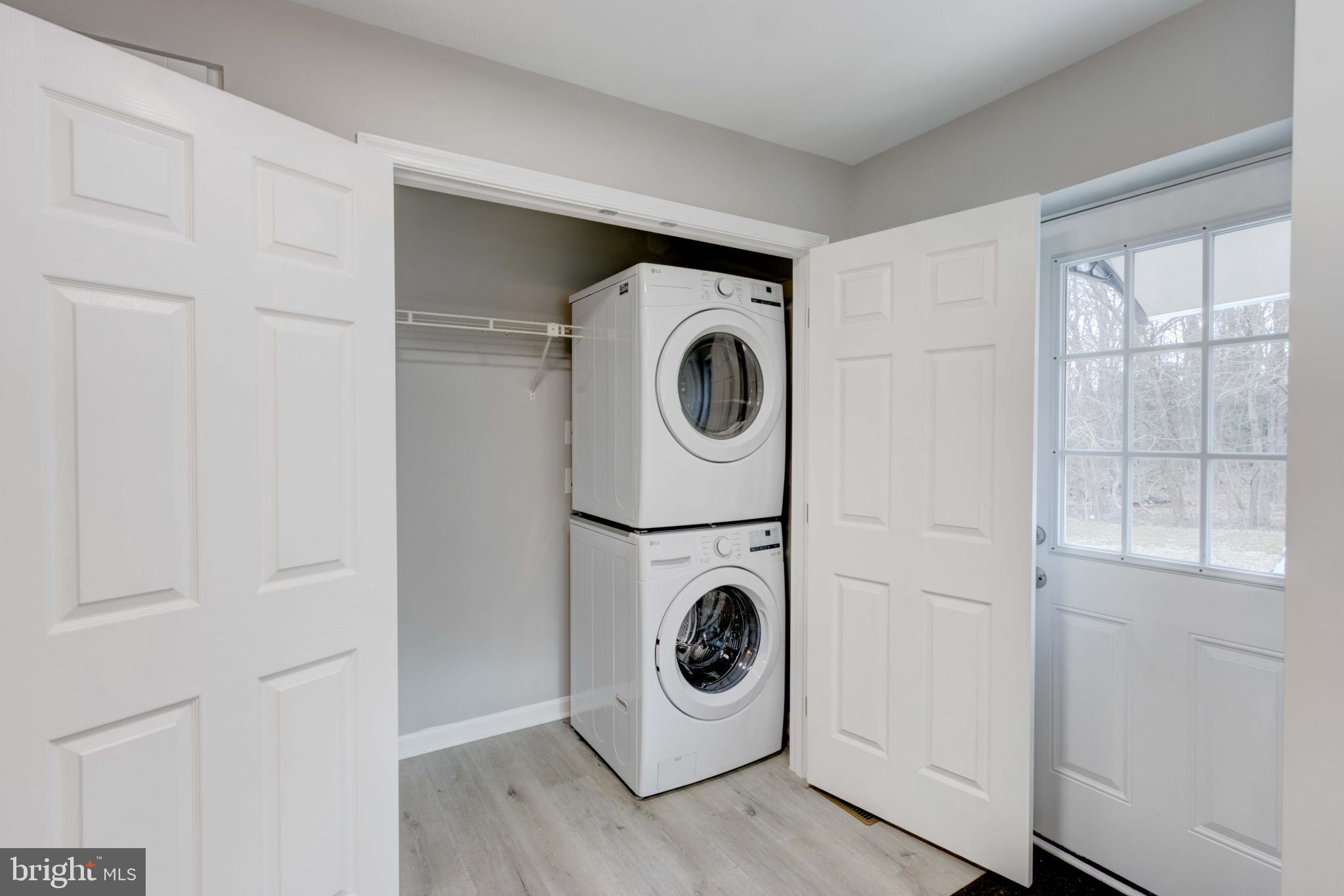 8149 Hog Neck Road Pasadena, MD 21122 - Photo 13 of 24 a utility room with dryer and washer