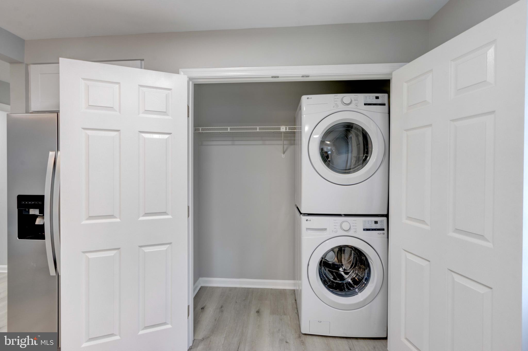8149 Hog Neck Road Pasadena, MD 21122 - Photo 15 of 24 a utility room with dryer and washer