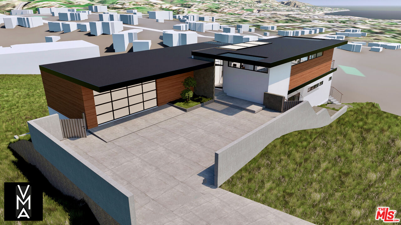 6756 Dume Drive Malibu, CA 90265 - Photo 6 of 17 a aerial view of a house with a yard