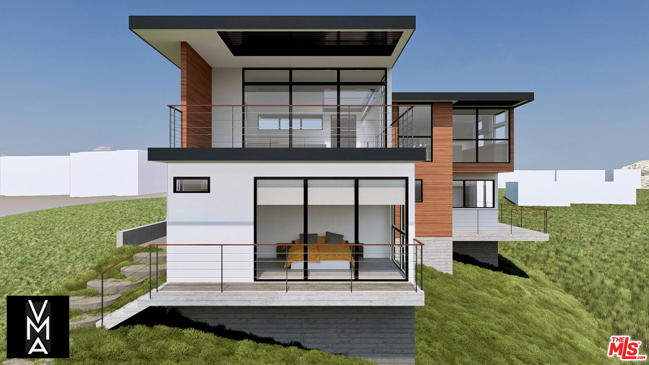 6756 Dume Drive Malibu, CA 90265 - Photo 7 of 17 front view of house with a yard