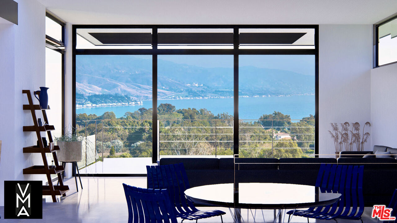6756 Dume Drive Malibu, CA 90265 - Photo 8 of 17 a view of a dining room with furniture window and wooden floor