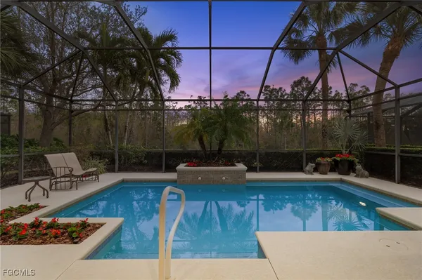 a view of a swimming pool with a patio