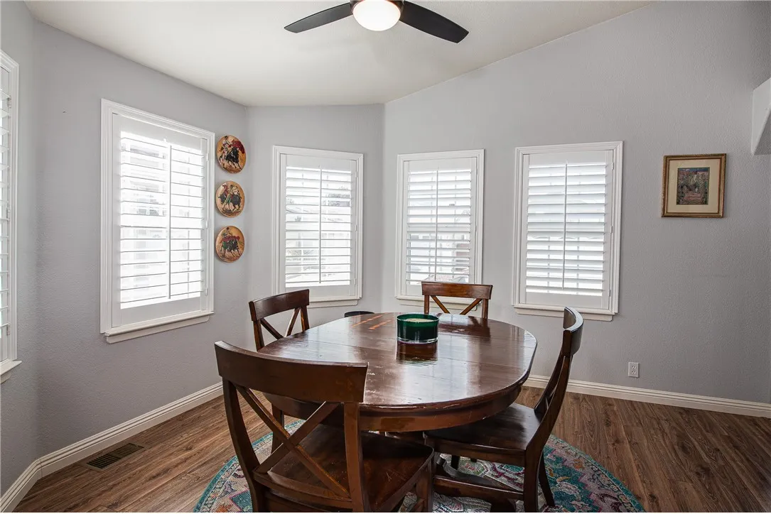 27250 Murrieta Road, Unit 304 Menifee, CA 92586 - Photo 3 of 29 a view of a dining room with furniture and window