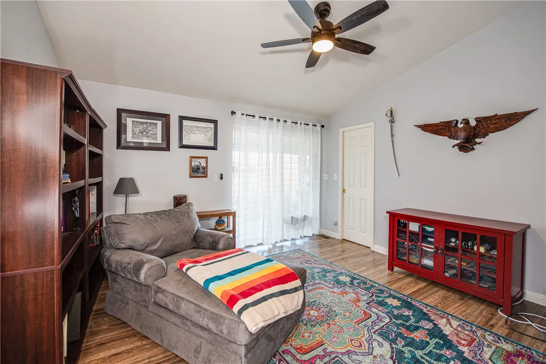 27250 Murrieta Road, Unit 304 Menifee, CA 92586 - Photo 8 of 29 a living room with furniture and a rug