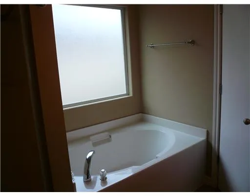 a view of a bathtub in a bathroom