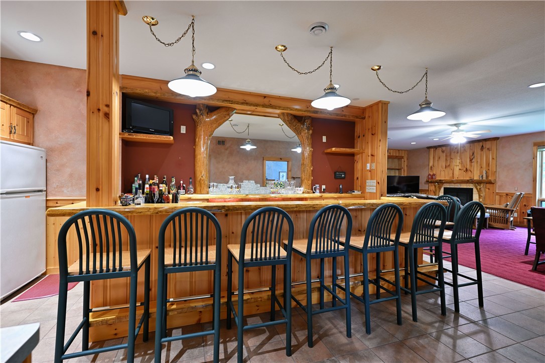 23165 Garmisch Road, Unit 23 Cable, WI 54821 - Photo 34 of 60 Bar w/ Plenty of Seating