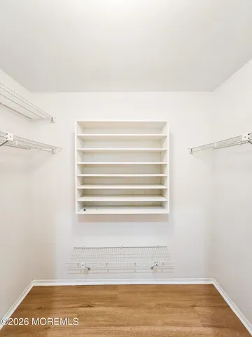 a room with a bed and a window