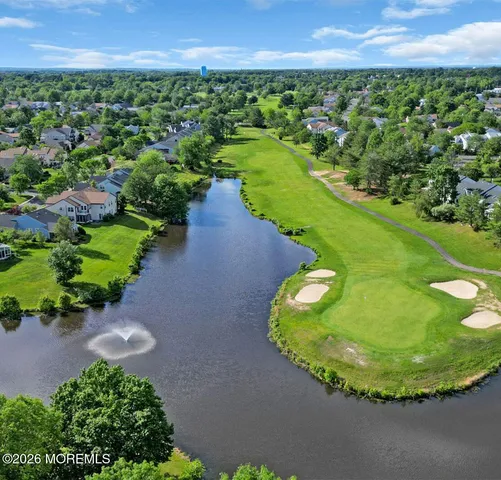 a view of a garden with houses
