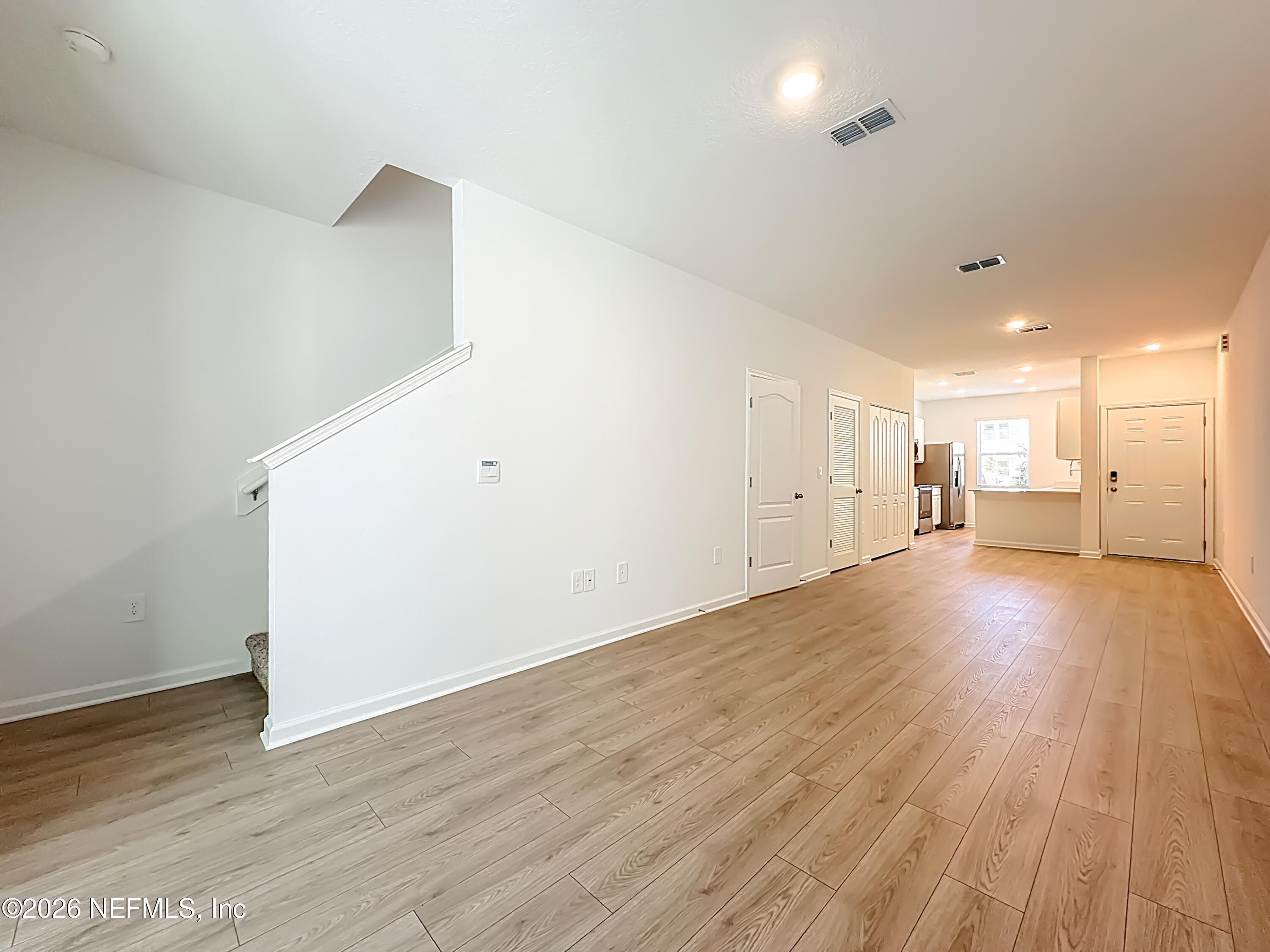 199 Palmetto Rdg Road St. Augustine, FL 32095 - Photo 5 of 11 a view of empty room with wooden floor