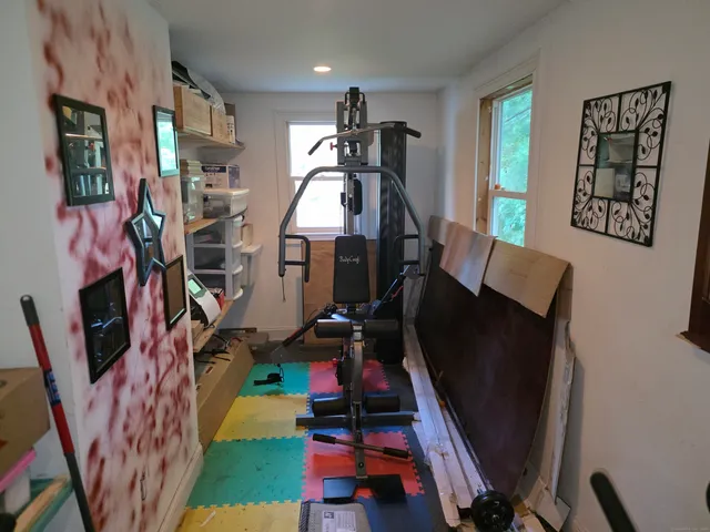 a patio with table and chairs