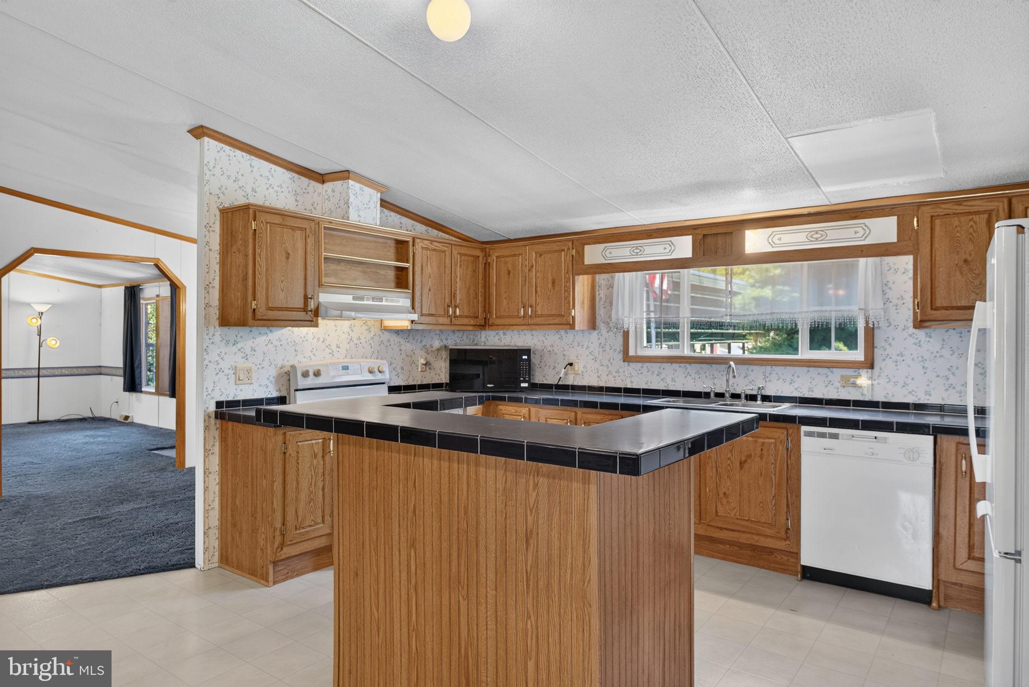 1910 Schubert Road, Unit 8 Bethel, PA 19507 - Photo 9 of 40 Appliance package includes dishwasher