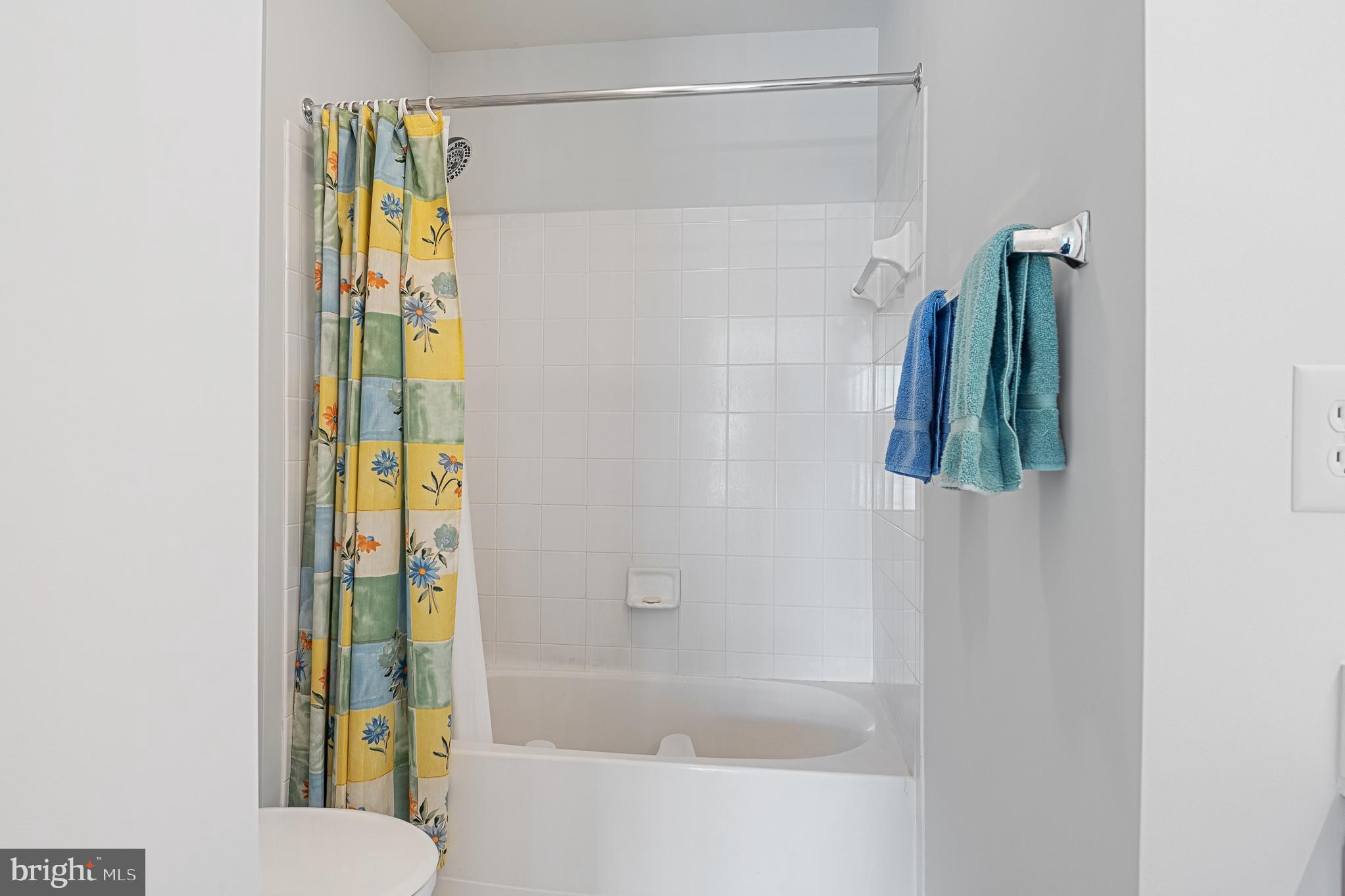 5953 Sandy Ridge Elkridge, MD 21075 - Photo 54 of 91 a bathroom with a shower and a bathtub