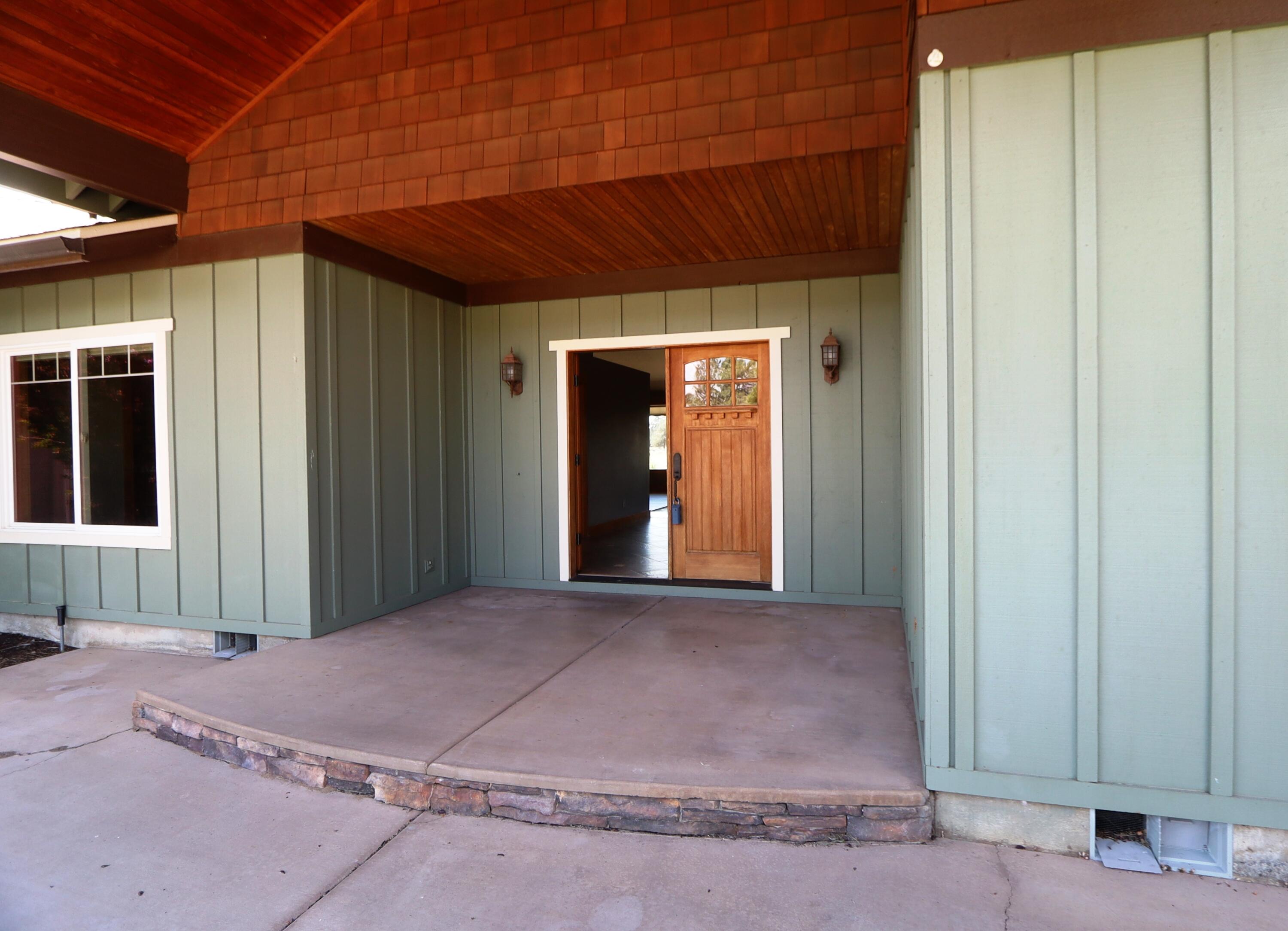 21491 Bear Creek Road Bend, OR 97701 - Photo 6 of 45 a front view of a house