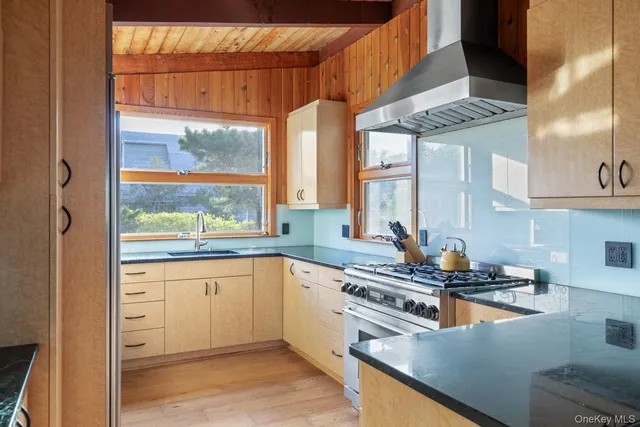 a view of a door and a window