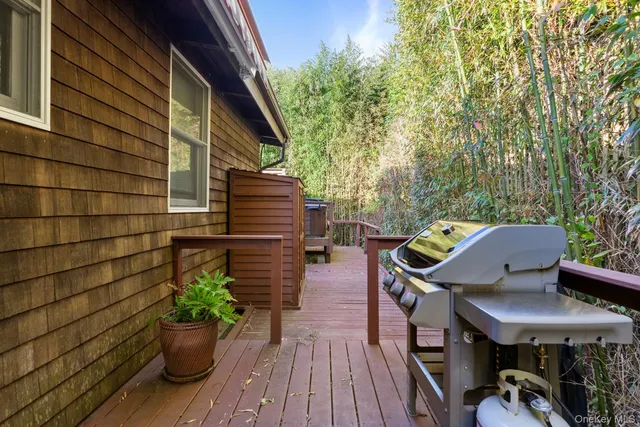 a balcony view with a seating space