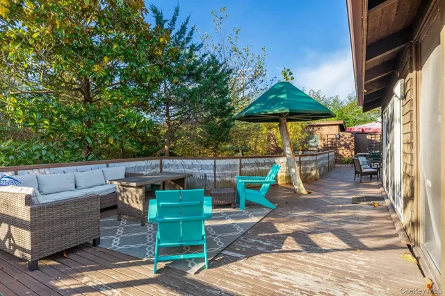 a view of outdoor space yard deck patio and outdoor kitchen