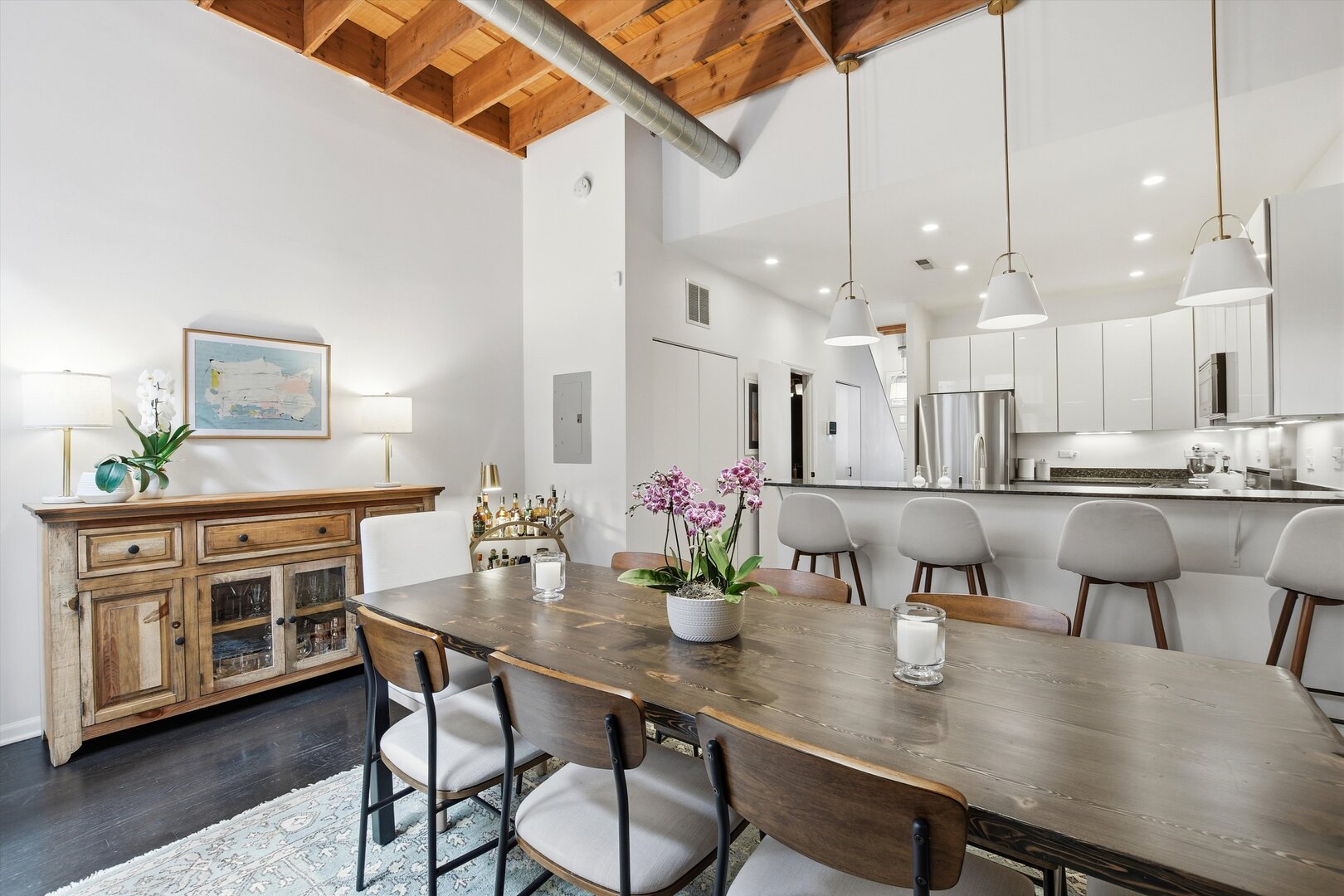1235 West George Street, Unit 103 Chicago, IL 60657 - Photo 11 of 28 a kitchen with a table and chairs in it