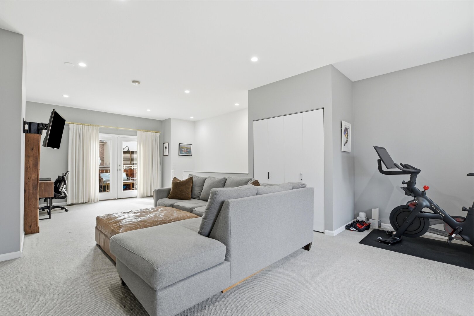 1235 West George Street, Unit 103 Chicago, IL 60657 - Photo 22 of 28 a living room with furniture a couch and a chandelier