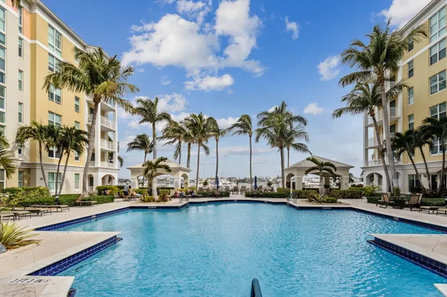 a view of a swimming pool with a lounge chairs