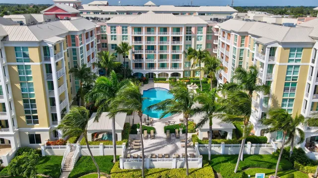 a view of multiple houses with a yard