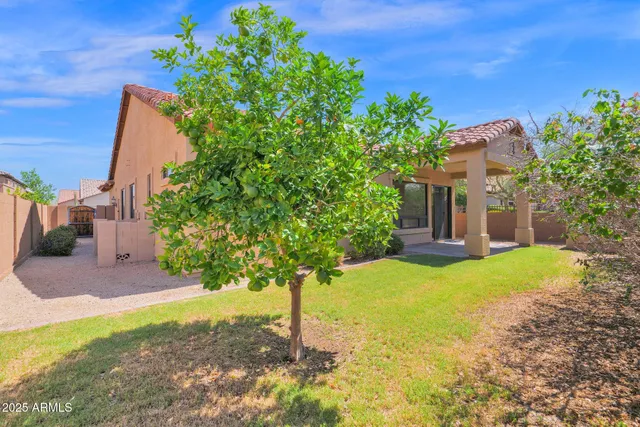 a view of a patio outdoor seating and city view