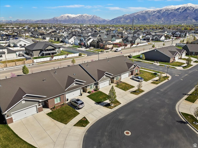 2028 West Grace Way Layton, UT 84041 - Photo 33 of 36 Aerial perspective of suburban area featuring a mountainous background